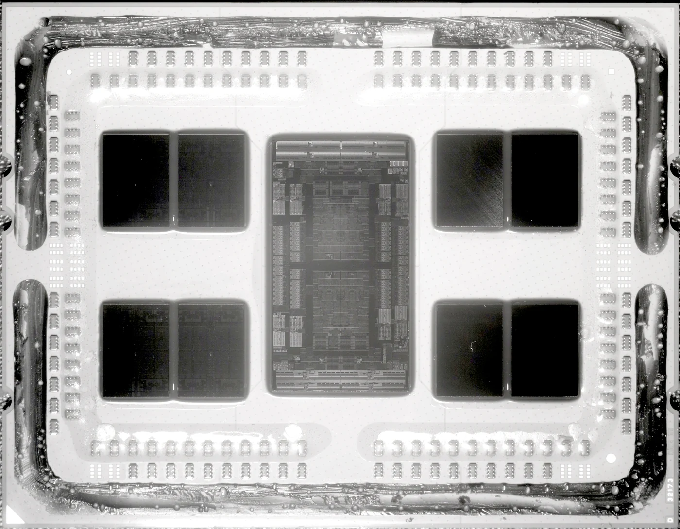 Near-infrared photograph of a delidded AMD EPYC 7702 package with eight compute chiplets and a central I/O die